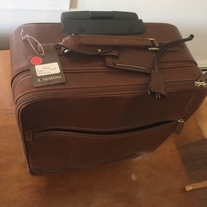 a. testoni Executive Carry-on suitcase.